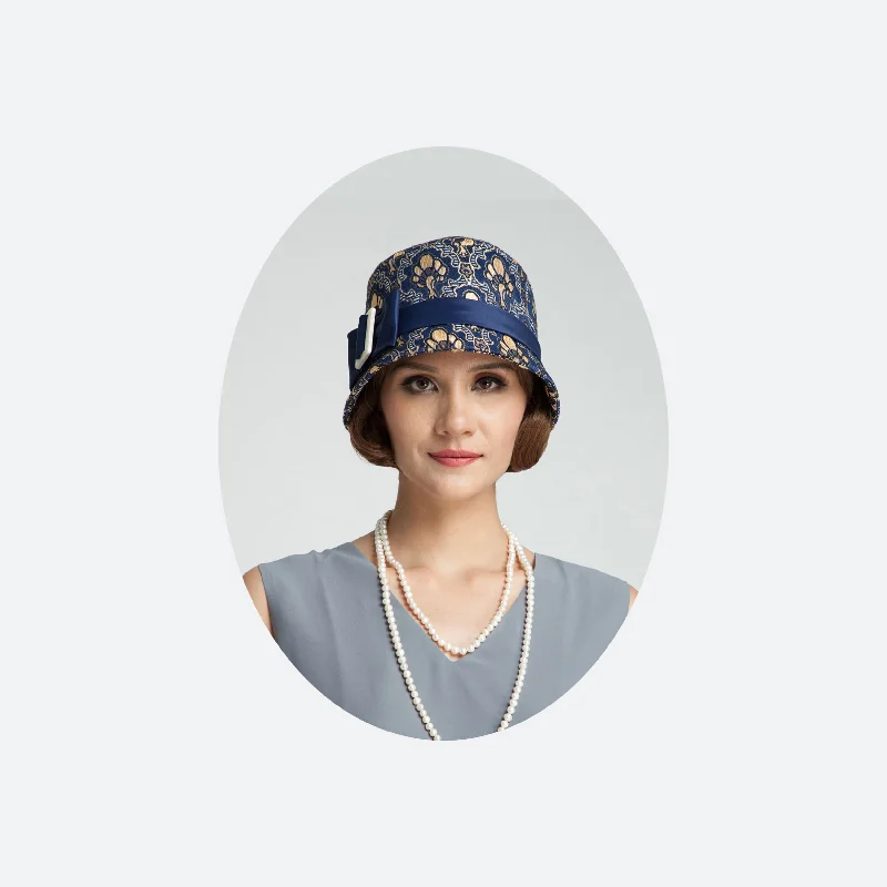 1920s cloche hat with blue and soft gold brocade fabric